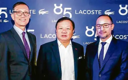  ??  ?? Johnny Sze, vice president and general manager of the Movado Group; Ivan Yao, managing director of Lucerne Group; and Stefan Glatz, marketing manager of the Movado Group