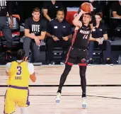  ?? KEVIN C. COX Getty Images ?? Heat rookie Tyler Herro, 20, is the youngest player in NBA history to start an NBA Finals game.