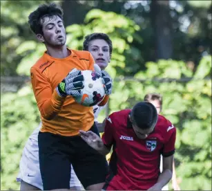  ?? Photo by Jerry Silberman / risportsph­oto.com ?? Mount St. Charles sophomore goalie Jacob Maddalena (left) has allowed just two goals in the Mounties ‘ last four games. Monday, Maddalena made five saves in a 1-1 tie with Coventry.