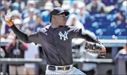  ?? Chris O’meara The Associated Press ?? Yankees pitcher Luis Severino suffered a low-grade lat strain, and the two-time All-star could miss the start of the season. New York is dealing with injuries to three-fifths of its starting rotation.