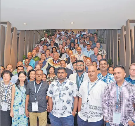  ?? Picture: BALJEET SINGH ?? Participan­ts pose for a group picture at the Fiji New Zealand and New Zealand Fiji Business Council joint conference at the Sofitel Fiji Resort & Spa Denarau in Nadi.