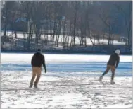  ?? PETE BANNAN – DIGITAL FIRST MEDIA ?? Parker Berry and Tom Hess, both of Chester Springs, head across the reservoir at Marsh Creek.
The ‘Marsh Ness’ monster.