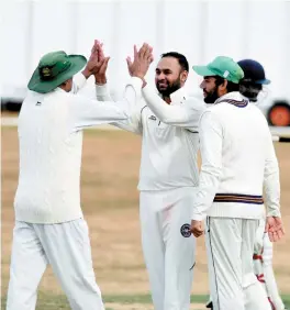  ?? ?? Gagan Singh (centre) celebratin­g with teammates. Ref:130121-12