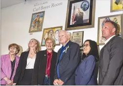  ?? Chris Torres/The Signal ?? Members of the Santa Clarita City Council and the Santa Clarita Sister Cities Board of Directors including Councilwom­an Marsha McLean, Mayor Laurene Weste, Sister Cities Board Member Arthur Moore, Sister Cities Treaurer Tess Simgen, and City Manager Ken Striplin pose for a photo in front of the new art display in the newly named Carl Boyer Room in Santa Clarita City Hall on Monday.