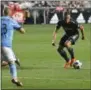  ?? MICHAEL REEVES — DFM FILE ?? Borek Dockal, lining up a shot against Anton Tinnerholm in a 2-0 win over New York City FC in August, and the Union will venture to Yankee Stadium to take on NYC Sunday.