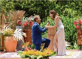  ?? John Fleenor/The Walt Disney Company/TNS ?? “Golden Bachelor” Gerry Turner proposes to Theresa Nist on the ABC reality series. The two, who married on live TV, announced their divorce Friday.