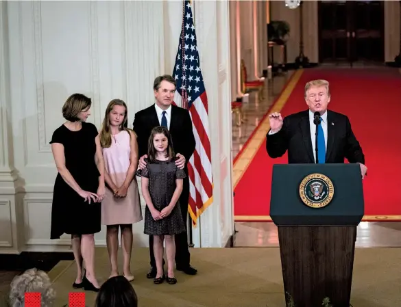  ??  ?? TRUMP’S MAN Kavanaugh, with his family, listens as the president announces his nomination in the White House on July 9.