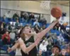  ?? GENE WALSH — MEDIANEWS GROUP ?? Pennridge’s Luke Yoder goes for a reverse layup against Abington Monday night.