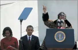  ?? CHARLES DHARAPAK — THE ASSOCIATED PRESS FILE ?? In this file photo, Aretha Franklin sings before President Barack Obama speaks during the dedication of the Martin Luther King Jr. Memorial in Washington.