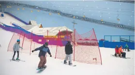  ?? Picture: AFP ?? GOING FOR GOLD. It’s not just about fun at the Wanda Harbin Ice and Snow Park.