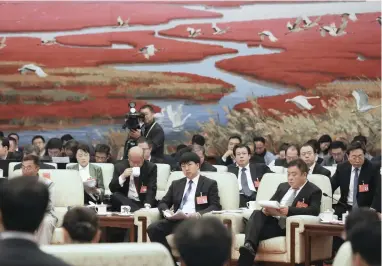  ?? PICTURES: EPA-EFE ?? DECIDING MOMENTS: Open delegation discussion­s of the 19th National Congress of the Communist Party of China (CPC) at the Great Hall of the People in Beijing. The party’s leadership is chosen at the congress.