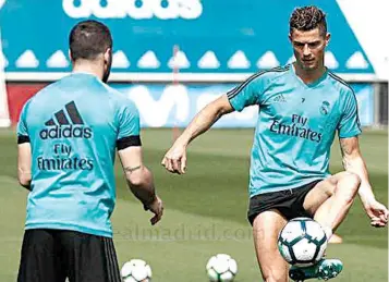  ??  ?? Cristiano Ronaldo in action during Real Madrid’s training session yesterday morning