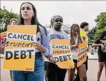  ?? Craig Hudson / For the Washington Post ?? Students and other activists rally against student debt outside the White House on Aug. 25, 2022.