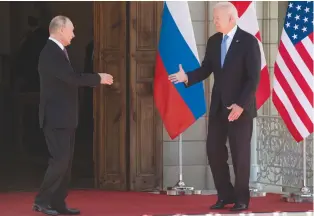  ?? (Saul Loeb/Reuters) ?? US PRESIDENT Joe Biden and Russian President Vladimir Putin are about to shake hands after arriving for the US-Russia summit at Villa La Grange in Geneva yesterday.