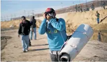  ?? Photo / AP ?? US agents fired tear gas into Mexico to stop some migrants who tried to breach the border.