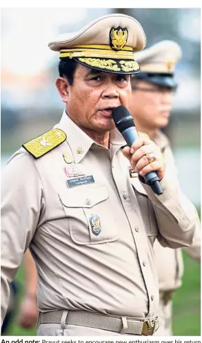  ?? — AFP ?? An odd note: Prayut seeks to encourage new enthusiasm over his return as a civilian leader with talent in stark contrast to his stern militarist­ic side – writing heartfelt ballads about progressiv­e ideals.