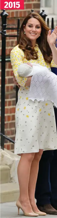  ??  ?? Smiles: Carrying Charlotte and wearing Jenny Packham again