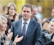  ?? JUSTIN TANG / THE CANADIAN PRESS ?? Andrew Scheer is keen to distinguis­h his Conservati­ve Party from the Liberals, but pandering to protection­ists is wrong, John Ivison writes.