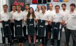  ??  ?? Members of the Aon Fast Track squad with Yachting New Zealand acting high performanc­e director Ian Neely.