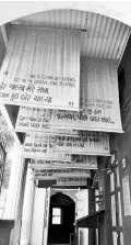  ??  ?? ( Anti-clockwise from top left) Banners containing quotes hang in a corridor of the Conflictor­ium museum in Ahmedabad; drawings and motifs from the Panchatant­ra and Animal Farmin the Gallery of Disputes; the auditorium inside the museum