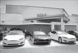  ?? Justin Sullivan Getty Images ?? SOME INVESTORS and analysts wonder whether growth in Tesla Model S sales is tapped out. Above, Model S cars outside a showroom in Corte Madera, Calif.