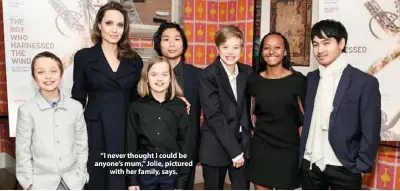  ??  ?? “I never thought I could be anyone’s mum,” Jolie, pictured with her family, says.