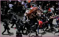  ?? ?? Police used force as Shireen Abu Akleh’s casket was carried from a Jerusalem hospital