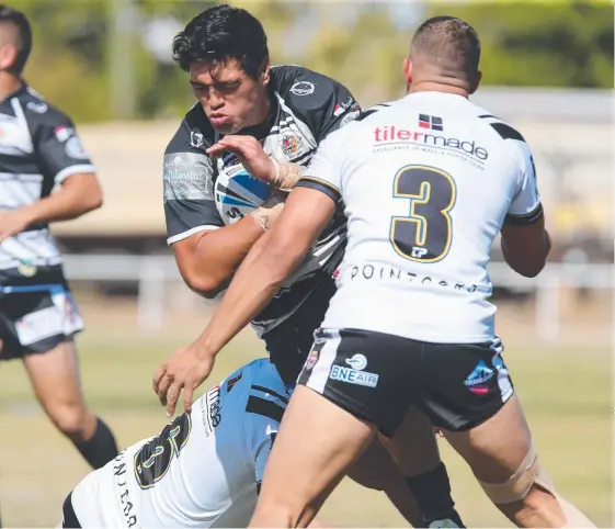  ?? Picture: QRL MEDIA ?? Lamar Liolevave, who inherited his side’s captaincy, runs the ball for Tweed Heads against Souths Logan at Julia Creek.