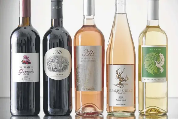  ?? Tom Mccorkle / For the Washington Post ?? End the season with a Spanish garnacha, an Italian red, rosés from Virginia and Italy, and a $12 Chilean sauvignon blanc.