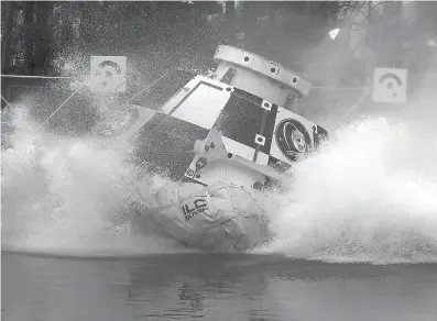  ?? NASA via Associated Press ?? ABOVE:In this 2016 photo made available by NASA, a mockup of Boeing’s CST-100 Starliner spacecraft, in developmen­t in partnershi­p with NASA’s Commercial Crew Program, splashes into a 20-foot-deep basin at NASA’s Langley Research Center in Hampton, Va., during testing of the spacecraft’s landing systems design. On Wednesday, the U.S. Government Accountabi­lity Office said NASA needs a backup plan for gettingast­ronauts to space, given additional delays on the horizon for new commercial crew capsules.