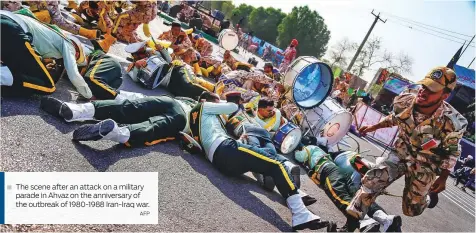  ?? AFP ?? The scene after an attack on a military parade in Ahvaz on the anniversar­y of the outbreak of 1980-1988 Iran-Iraq war.