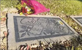  ?? Gustavo Arellano Los Angeles Times ?? THE GRAVE of Jose Gallardo Diaz, a 22-year-old man whose killing in 1942 led to the Zoot Suit riots, at Calvary Cemetery in East Los Angeles.