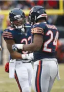  ?? | AP ?? Bears running backs Jeremy Langford ( left) and Jordan Howard have been given more leeway to celebrate.