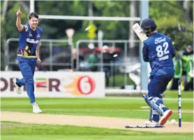  ?? PHOTO: GERARD O’BRIEN ?? Celebratio­ns, at least, undampened . . . Otago bowler Jacob Duffy enjoys removing two of Auckland opening batsman Colin Munro’s stumps at the University of Otago Oval yesterday.