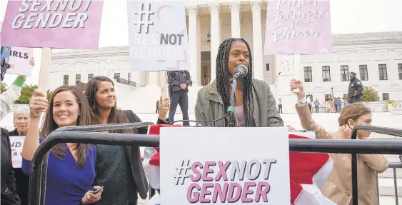  ?? CONTRIBUTE­D PHOTO ?? Alexis Lightcap speaks at an Oct. 8 demonstrat­ion in front of the Supreme Court Building in Washington, D.C.