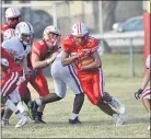  ?? KYLE FRANKO — TRENTONIAN PHOTO ?? Bristol’s Elijah Alexandre (24) carries the ball against Acadmey of the NewChurch during Friday’s football game.