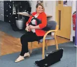  ??  ?? South Uist piper, Alana MacInnes, pictured here at a Care for a Ceilidh event in Glasgow, will team up with Brighde Chaimbeul to host two small pipe workshops in Glasgow.