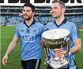  ?? SPORTSFILE ?? 20 September 2015; Alan Brogan and his brother Bernard, Blues brothers: Bernard (left) and Alan Brogan celebrate Dublin’s Allianz League Division 1 final victory over Derry in 2014
