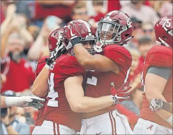  ?? ASSOCIATED PRESS FILE PHOTO] [BRYNN ANDERSON/THE ?? Alabama got the fourth spot over Ohio State in the College Football Playoff, joining Georgia and giving the Southeaste­rn Conference two teams in the bracket.