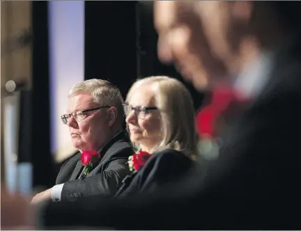  ?? LAURA PEDERSEN ?? Home Capital board member Alan Hibben, left, sits with Bonita Then, interim president and CEO of the alternativ­e mortgage lender, at its annual general meeting in Toronto on Thursday. Hibben said the company plans to “eventually return to a path of...