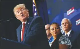  ?? AP PHOTO/EVAN VUCCI ?? President Donald Trump delivers remarks on immigratio­n Friday alongside family members affected by crime committed by undocument­ed immigrants at the South Court Auditorium on the White House complex.