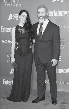  ??  ?? Rosalind Ross (left) and actor/director Mel Gibson attend The 22nd Annual Critics' Choice Awards at Barker Hangar on Sunday in Santa Monica, California. — AFP photo