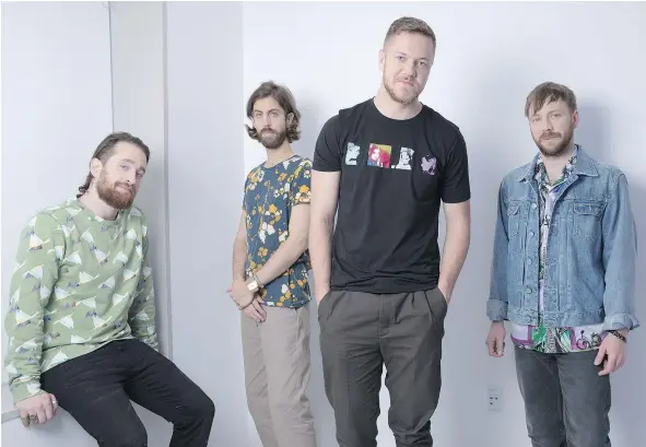  ?? — THE ASSOCIATED PRESS FILES ?? After a year-long break, Imagine Dragons’ Daniel Platzman, left, Wayne Sermon, Dan Reynolds and Ben McKee are delighted by their latest album release, Evolve, which isn’t as overproduc­ed as previous albums.
