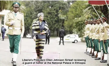  ??  ?? Liberia's President Ellen Johnson Sirleaf reviewing a guard of honor at the National Palace in Ethiopia