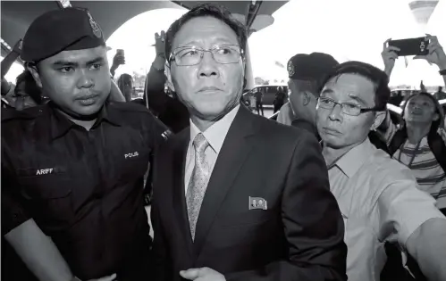  ??  ?? North Korean Ambassador to Malaysia Kang Chol, who was expelled from Malaysia, arrives at Kuala Lumpur Internatio­nal Airport on Monday.