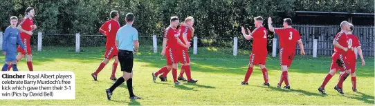  ??  ?? Clincher Royal Albert players celebrate Barry Murdoch’s free kick which gave them their 3-1 win (Pics by David Bell)