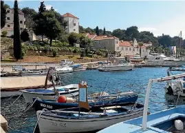  ??  ?? The tiny harbour of Maslinica on the island of Solta.