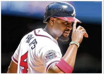  ?? CURTIS COMPTON / ATLANTA JOURNAL-CONSTITUTI­ON ?? Whether on the field or through social media, former Reds second baseman Brandon Phillips still enjoys connecting with fans. Phillips has 1.1 million Twitter followers.