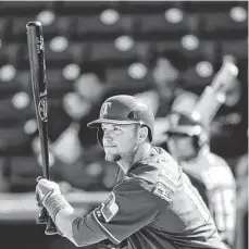  ?? AP ?? Rangers catcher A.J. Pierzynski watches his single during a Cactus League game on Tuesday. Pierzynski has a one-year contract with Texas.