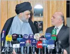  ??  ?? HAIDAR HAMDANI/AFP Iraqi Prime Minister Haider al-abadi (R) attends a press conference with Iraqi Shia cleric Moqtada al-sadr in Najaf on June 23, 2018.